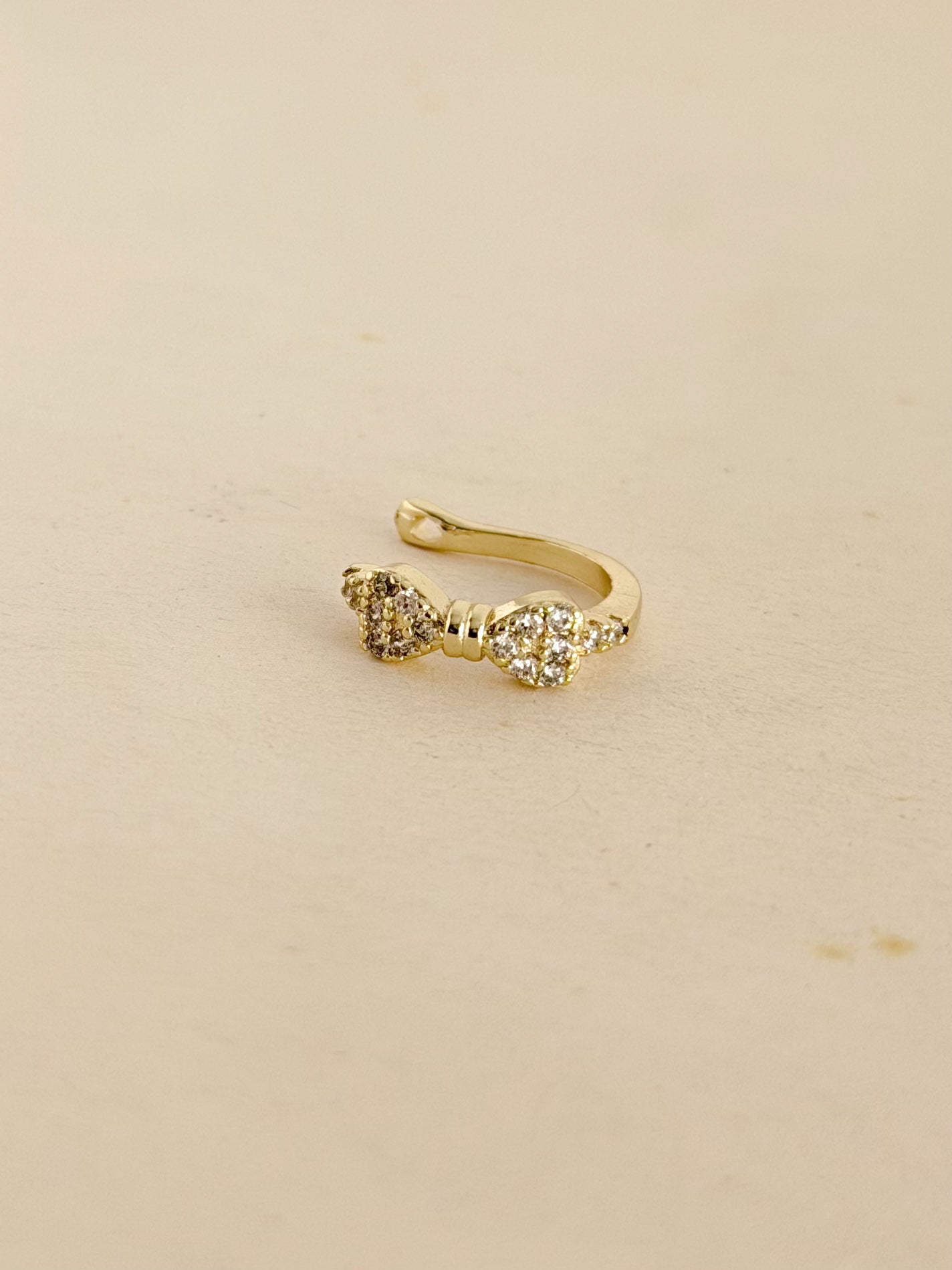 Earcuff Moño Microzircones Rodio
