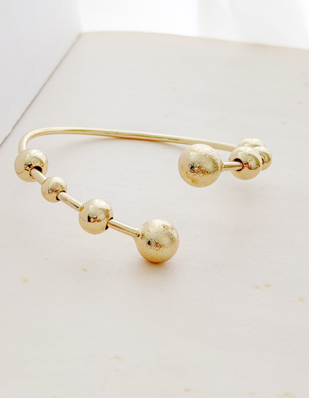 Pulsera Aro Nudo Zircon Baguette Rodio