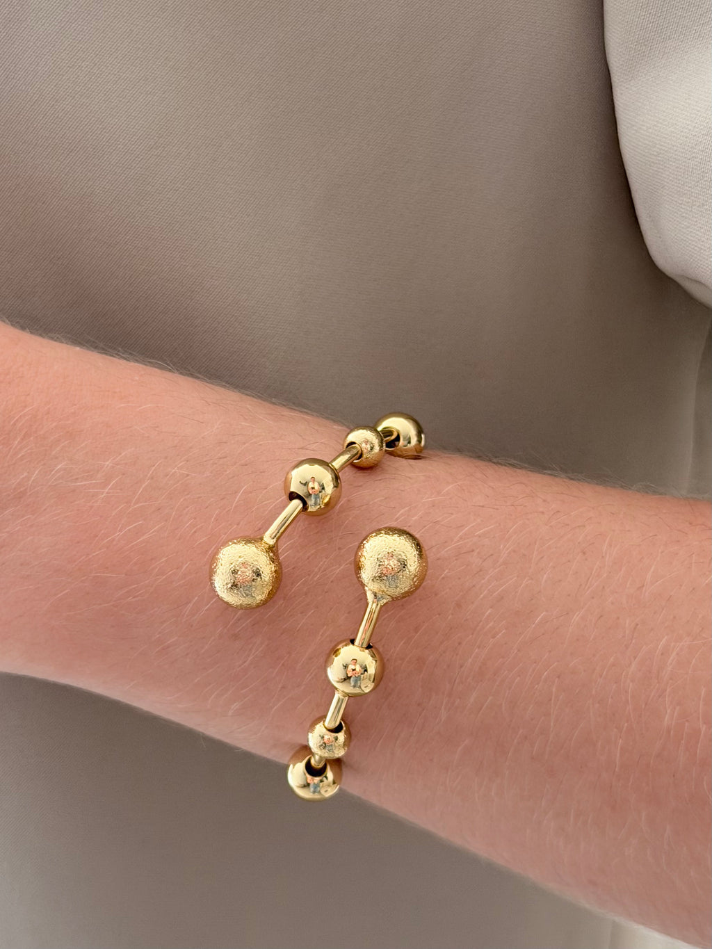 Pulsera Aro Nudo Zircon Baguette Rodio