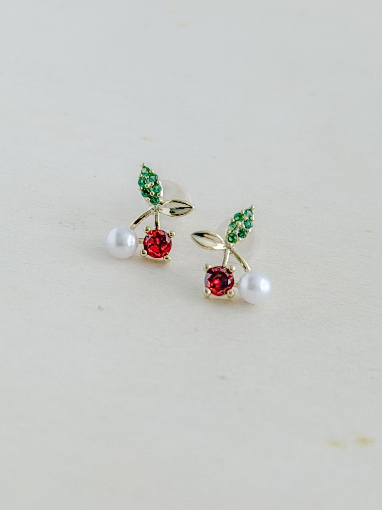 Topo Cereza Zircon Rojo/Perla Rodio